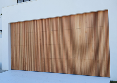 Custom Sectional Door with vertical castellation, Western Red Cedar