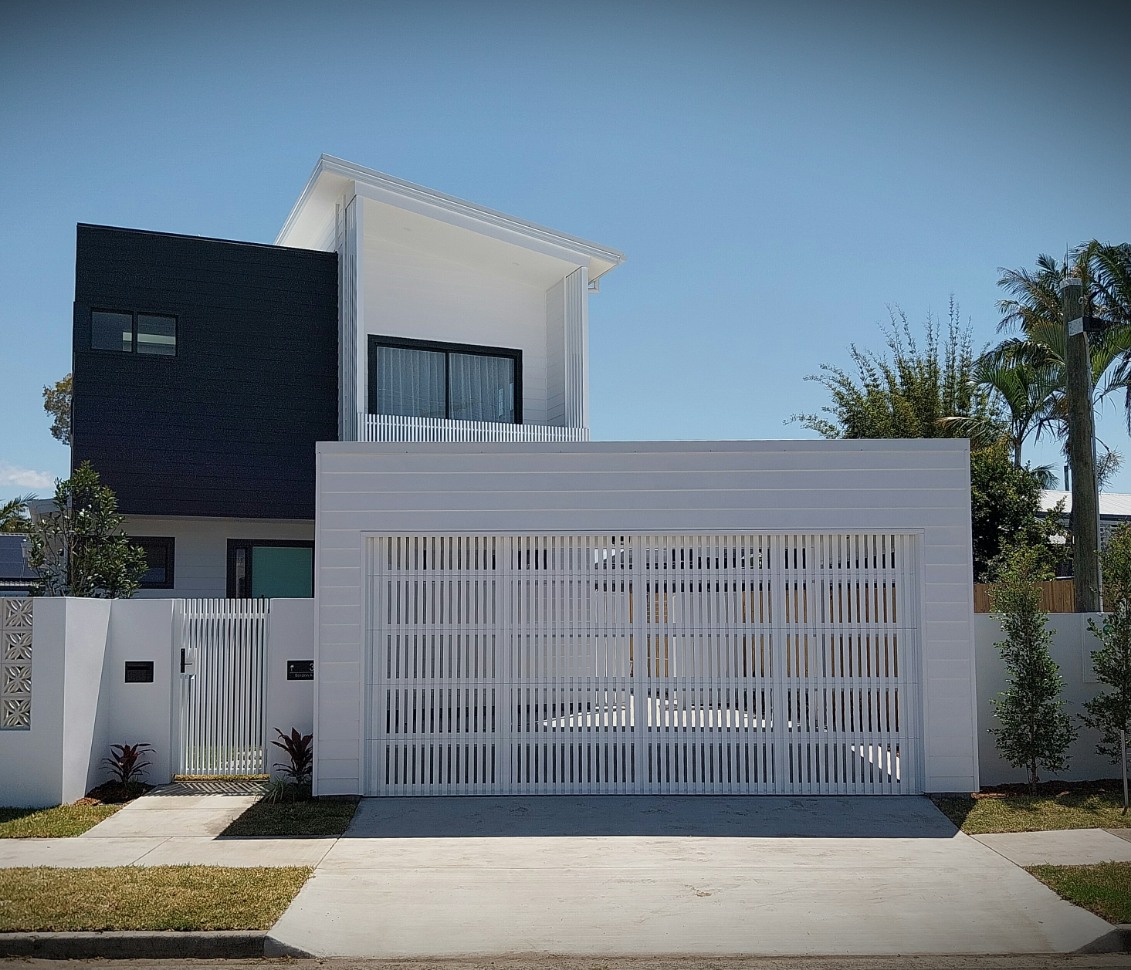 Custom Vertical Slatted Door in Pearl White